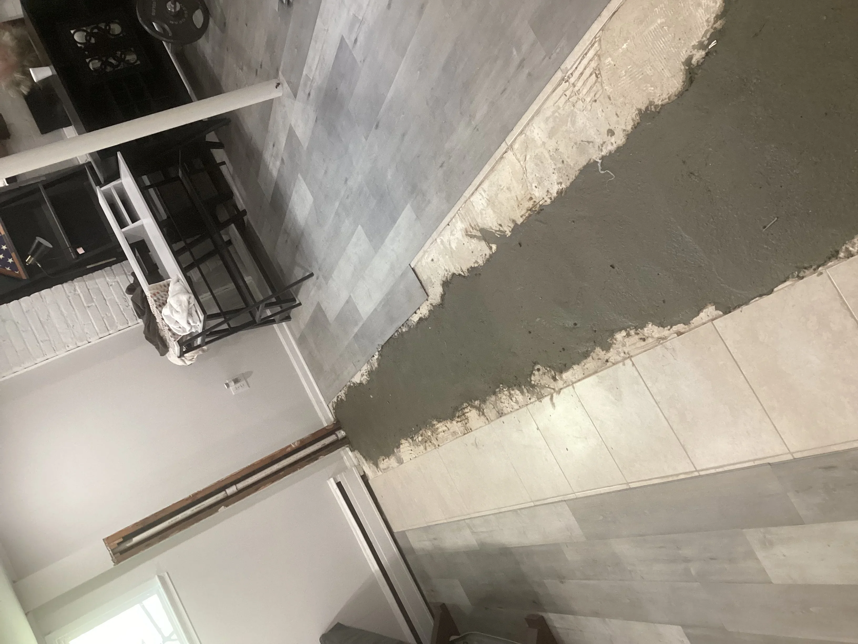 Concrete floor trench with utility preparation in commercial construction space